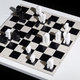 Illustration for article titled This Typographic Chess Set Is Too Pretty to Play